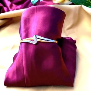 Diamond, 14k  gold with 23 full cut diamonds  bangle bracelet.